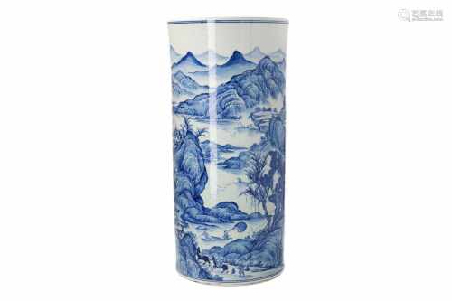 A blue and white porcelain vase, decorated with mountainous river landscape with houses. Marked
