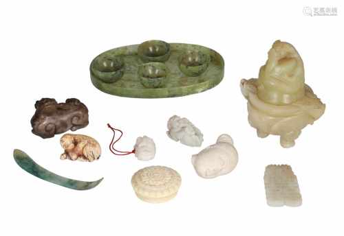 A diverse lot of ca. 14 items, including i.a. jade pendants, censer and cups on dish and an ivory