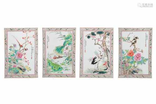 A lot of four polychrome porcelain plaques, decorated with flowers and birds. China, 20th century.