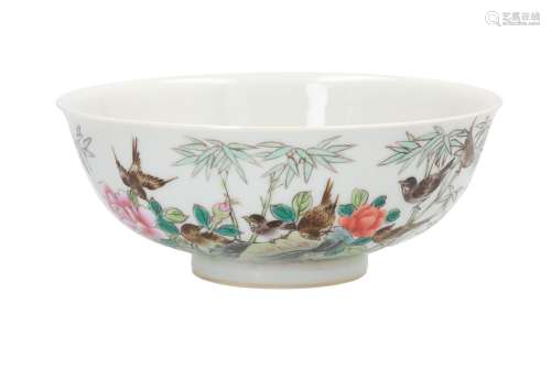 A polychrome porcelain bowl, decorated with birds, flowers and a poem. Marked with 6-character