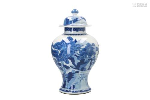 A blue and white porcelain lidded vase, decorated with animals in mountainous river landscape.