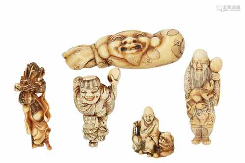 Lot of five netsuke, 1) Ivory Gama Sennin with dragon and ball. H. 6,5 cm. 2) Ivory Sennin with