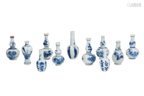 Lot of eleven blue and white porcelain miniature vases, decorated with flowers, long Elizas,