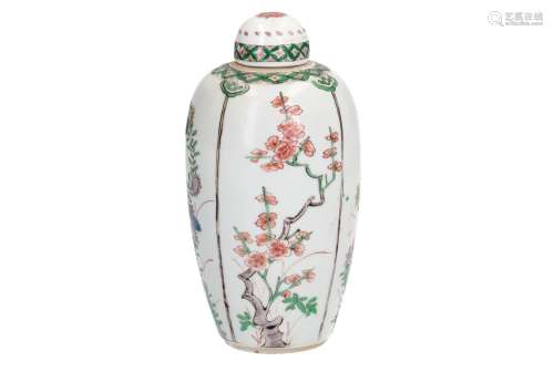 A famille verte porcelain lidded vase, decorated with panels and flower branches. Unmarked. China,