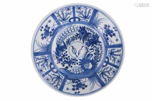 A blue and white porcelain dish, decorated with flowers, birds and VOC. Unmarked. Japan, ca. 1900.