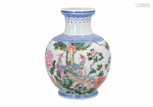 A polychrome porcelain vase, decorated with flowers, phoenixes and characters. Marked with seal mark