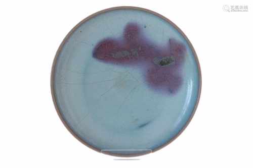 A blue glazed Yun-ware dish on ring, decorated with a purple splash. Unmarked. China, Song - Jin. H.