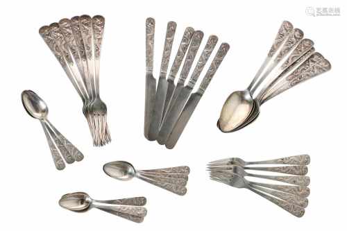 A 34-piece silver cutlery consisting of: 6 forks, 6 spoons, 6 knives, 6 small forks and 10 dessert