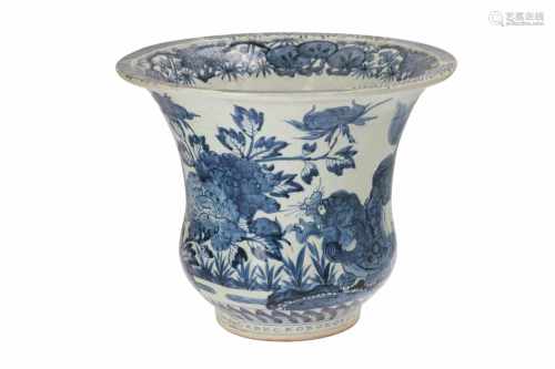 A blue and white porcelain cachepot, decorated on the outer side with qilins surrounded by