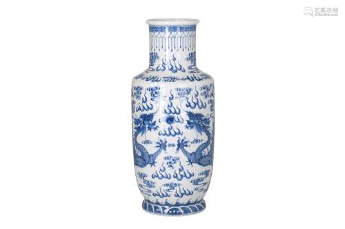 A blue and white porcelain vase, decorated with dragons chasing the burning pearl. Unmarked.