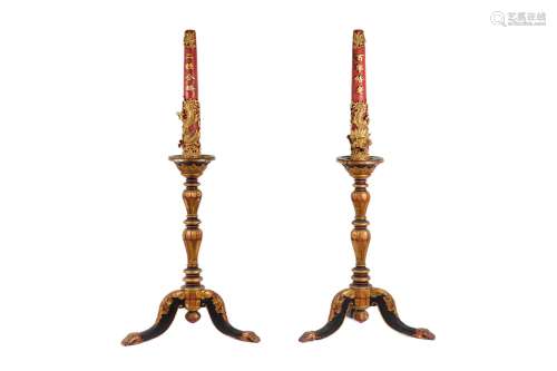 A pair of wooden candlesticks, decorated with characters. China, ca. 1900. H: 184 cm