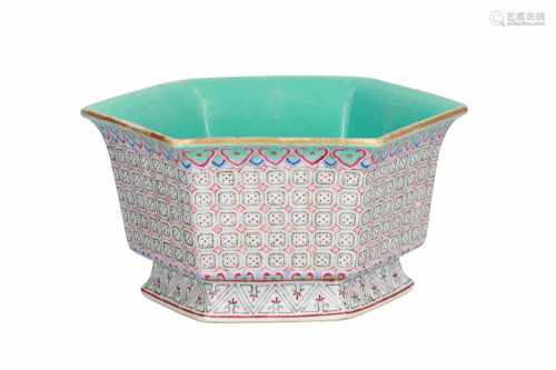 A hexagonal polychrome porcelain bowl, decorated with geometric patterns. Marked with seal mark