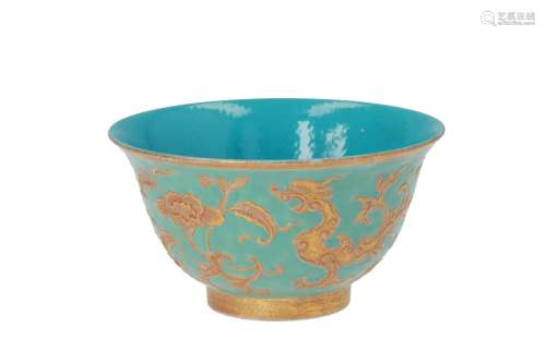 A polychrome porcelain bowl, decorated with flowers and dragons. Marked with seal mark Jiaxing.