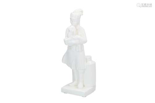 A white porcelain sculpture of a woman holding a lamb. Unmarked. China, 20th century. H. 32 cm.