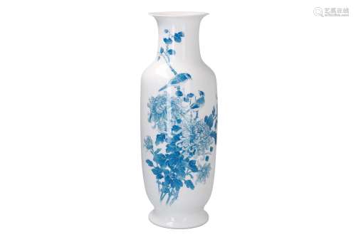 A blue and white porcelain vase, decorated with birds and flowers in the style of Wang Bu. Marked