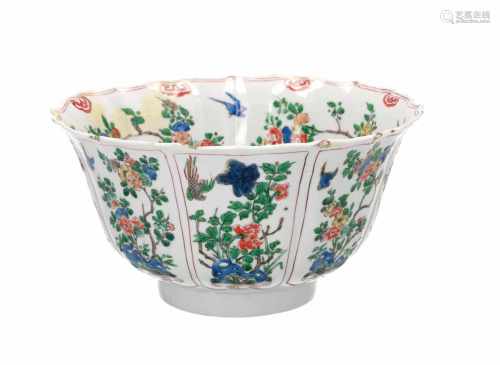 A famille verte porcelain bowl, decorated with flowers, birds and butterflies. Marked with seal