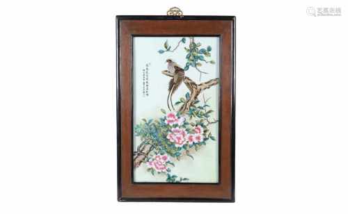 A polychrome porcelain plaque in wooden frame, depicting birds, flowers and a poem. Made in 1986.