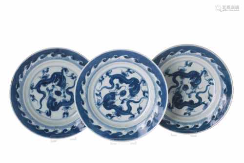 Set of three dishes, decorated with dragons chasing the burning pearl. Marked with seal mark. China,