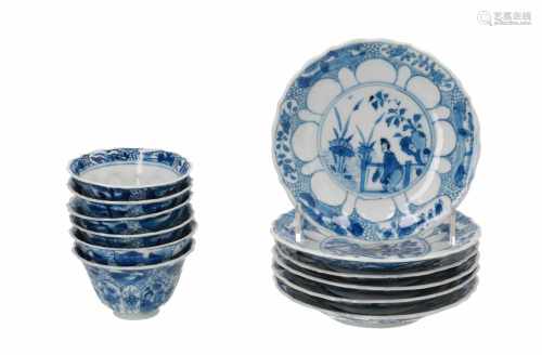 Set of six blue and white porcelain cups with saucers, decorated with a lady in a garden and