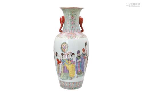 A polychrome porcelain vase with handles in the shape of elephant heads, decorated with figures, a