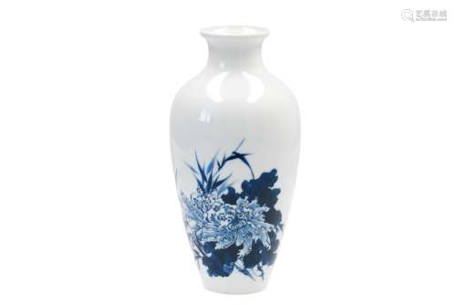 A blue and white porcelain vase, decorated with flowers in the style of Wang Bu. Marked with seal