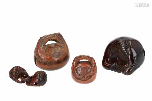 Lot of four netsuke, 1) Wooden temple bells with ring, carved from one piece. L. 5,5 cm. 2) Wooden