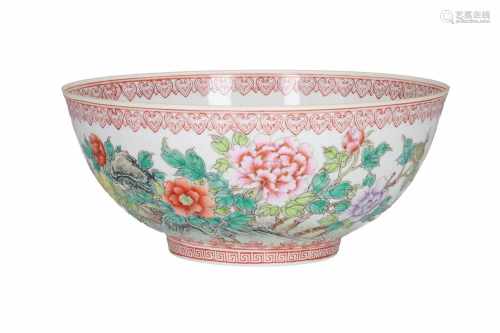 A polychrome eggshell porcelain bowl, decorated with flowers and characters. Marked with seal