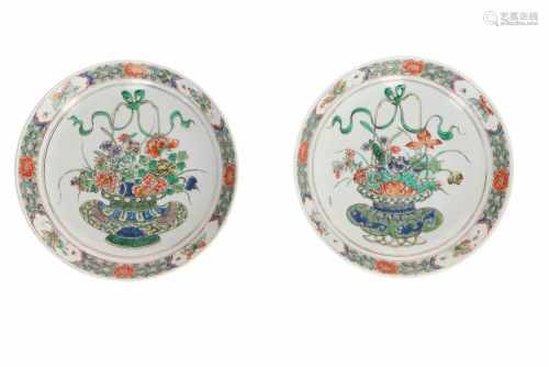 A pair of famille verte porcelain deep dishes, decorated with vases and flowers. Unmarked. China,