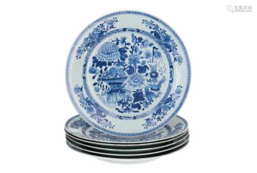 A set of six blue and white porcelain dishes, decorated with flowers and vases. Unmarked. China,