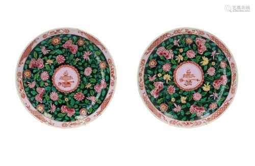 A pair of famille rose porcelain dishes, decorated with flowers and incense burner. Marked with