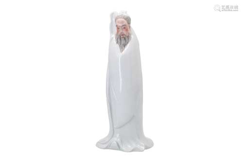 A white and gray porcelain sculpture of the poet Tao Yuan Ming. After a design of Liu Yuan Chang.