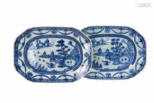 A pair of octagonal blue and white porcelain meat dishes, decorated with a pavilion in a river