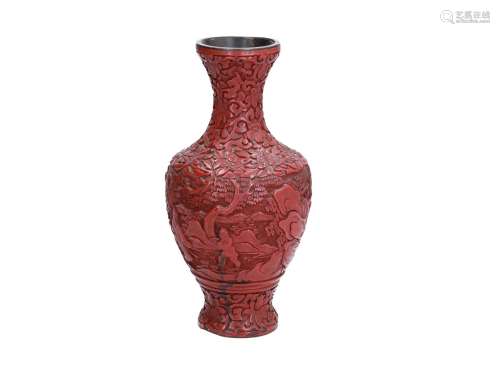 A cinnabar vase, decorated with a mountainous landscape with figures and flowers. Unmarked. China,