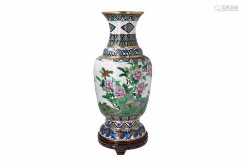 A large polychrome cloissoné vase on wooden base, decorated with flowers. Unmarked. China, 20th