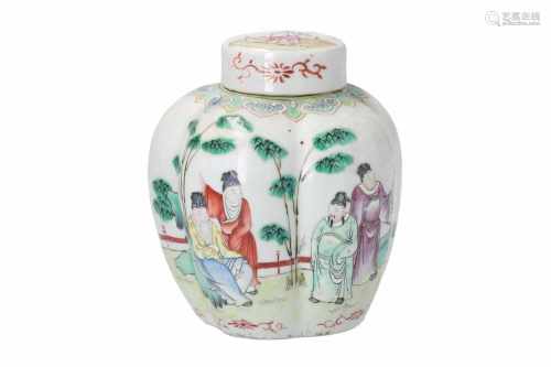 A polychrome porcelain lidded jar, decorated with figures in a garden. Marked with 4-character