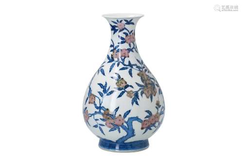 A blue and underglaze red porcelain vase, decorated with flowers. Marked with seal mark Yongzheng.