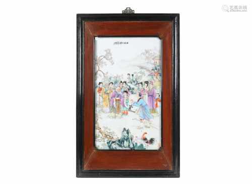 A polychrome porcelain plaque in wooden frame, depicting characters and figures showing respect to