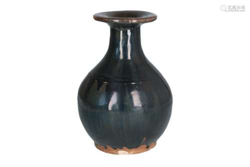 A black glazed ceramic vase with flaring rim. Unmarked. China, 19th century. H. 28,5 cm.