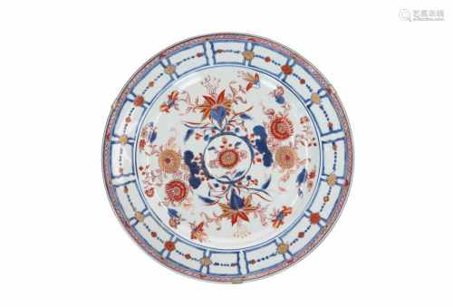An Imari porcelain charger, decorated with flowers and geomatric pattern. Marked with symbol. China,