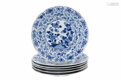 A set of six blue and white porcelain dishes, decorated with fruits. The rim with fish, shrimps