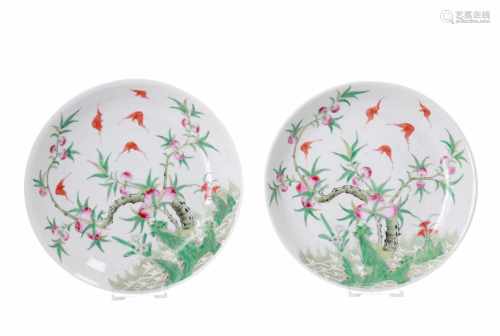 A pair of two polychrome porcelain dishes, decorated with a peach tree and bats. Marked with 4-