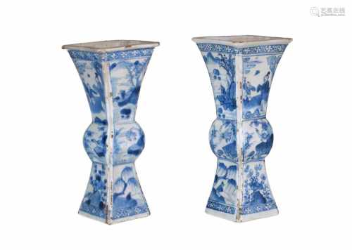 A pair of blue and white porcelain trumpet vases, decorated with figures in landscapes. Unmarked.