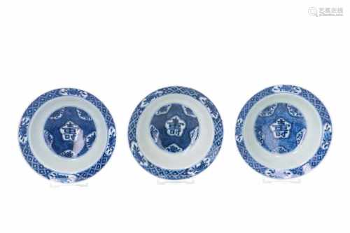 A lot of three blue and white porcelain bowls, decorated with flowers and Shou sign. Marked with 6-