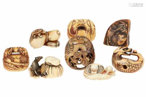 Lot of eight netsuke, 1) Ivory rat on Daikoku's hammer with bag. L. 4 cm. 2) Ivory temple bell on