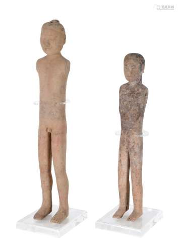 Lot of two pottery sculptures, depicting a nude man and woman. China, western Han, 188 BC - AD 6
