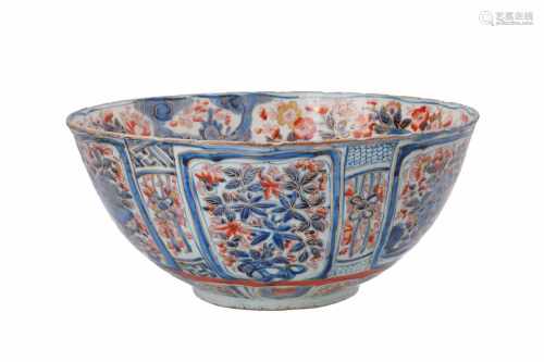A large Imari porcelain bowl, decorated with flowers, birds and butterflies. Unmarked. China, Wanli.