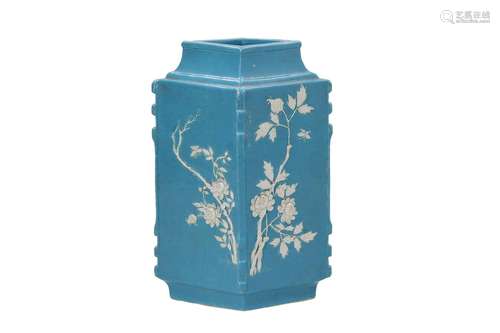 A clair de lune porcelain cong vase, decorated with flowers in relief. Unmarked. China, 20th