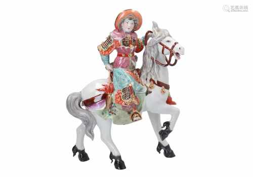 A large polychrome porcelain sculpture, depicting a warrior with spear on a horse. Unmarked.