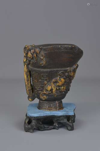 A Chinese carved bamboo libation cup with later st