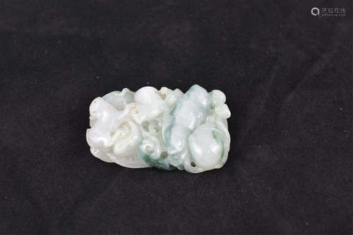 A Chinese carved jadeite pendant. 5 cm.